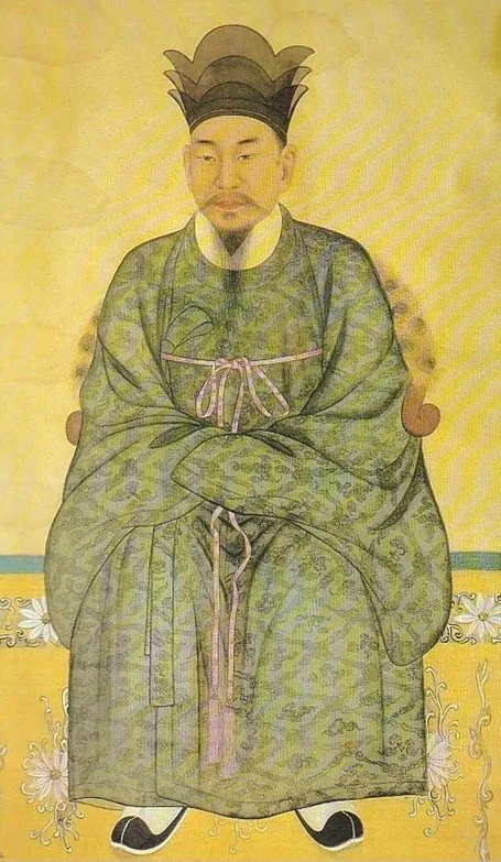 녹색 관복을 입고 앉아 있는 동학 창시자 최제우의 초상화